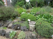 pond rockery with masonry from Tower of London